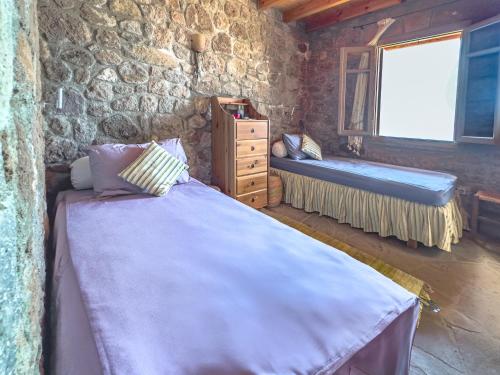 Postel nebo postele na pokoji v ubytování Jules and Jim Villa