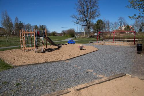 a park with a playground with a play equipment at Haby House in Skene
