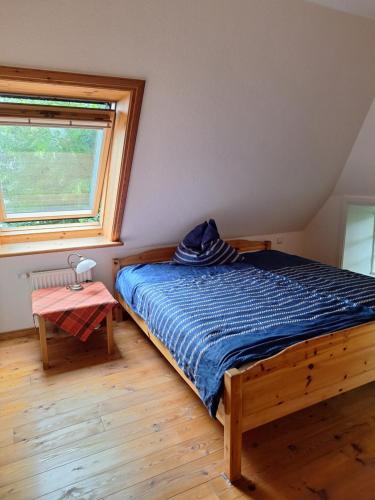 Postel nebo postele na pokoji v ubytování Ferienwohnung Land-Deern in Enge Nordfriesland