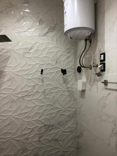 Ένα μπάνιο στο APPARTEMENT MEUBLE DAKAR Suite 2