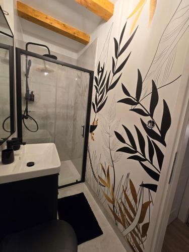 a bathroom with a shower and a sink at Apartments Rose 5 in Cres