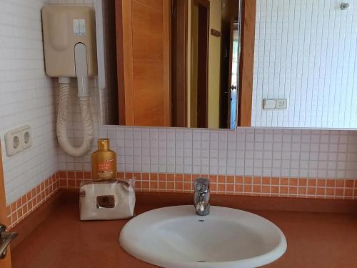 Koupelna v ubytování Apartamentos Ababides