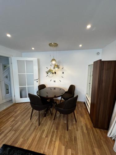 a dining room with a table and chairs at No1 Apartments in heart of Sarajevo in Sarajevo