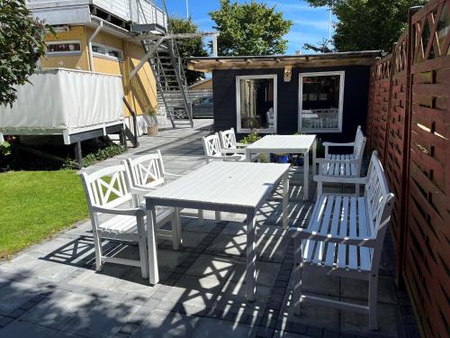 a table and chairs sitting on a patio at Oddevej 20 Skagen in Skagen