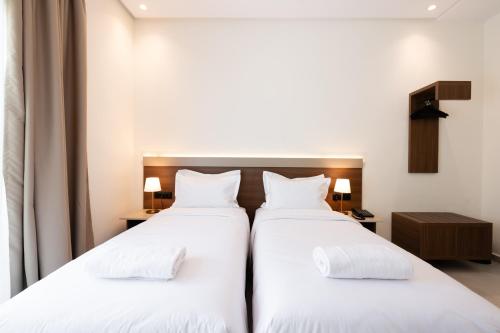 Cama o camas de una habitación en Hotel El Toro Tanger