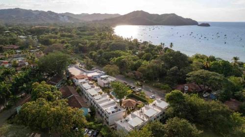 an aerial view of a resort and the water at Ocean Breeze Condo in Coco