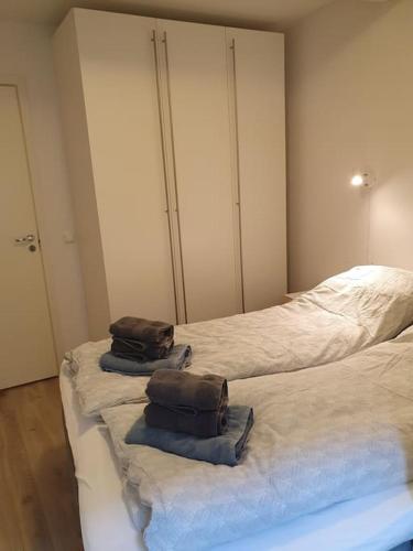 Ένα ή περισσότερα κρεβάτια σε δωμάτιο στο Corner apartment with 2 bedrooms in the middle of the city centre