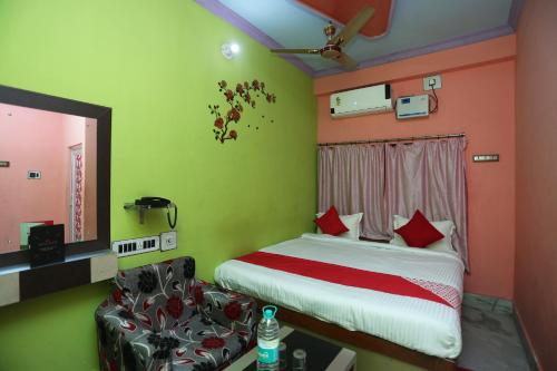Hotel O Sanjogにあるベッド