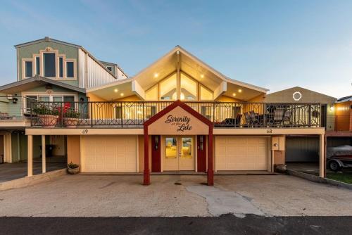 a large house with a sign that reads simply slip at Lakefront 3BR w Balconies Near French Qtr in New Orleans