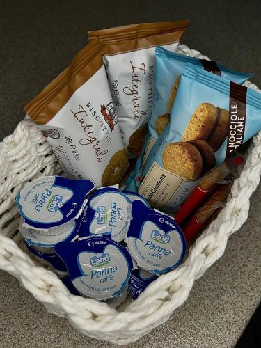 a basket filled with different types of bread at A CASA DI GIANCARLA in Bologna