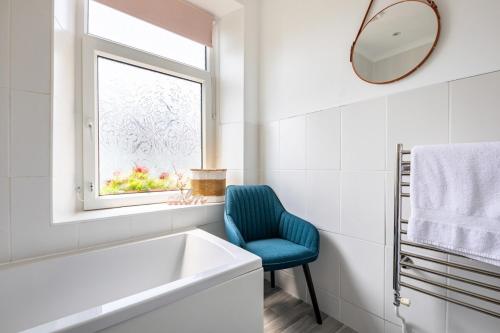 Ένα μπάνιο στο Coastal Family Stay 3-bed Parking Wi-fi