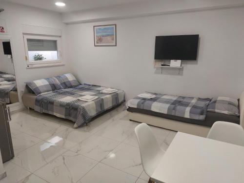 Apartmani Anastasia with pool, Novalja
