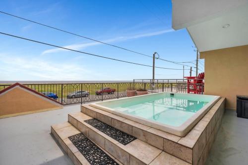 a swimming pool on the balcony of a house at Lakefront 3BR w Balconies Near French Qtr in New Orleans