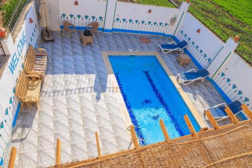 Kolam renang di atau dekat dengan Quiet Gate Guest House