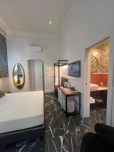 Ένα ή περισσότερα κρεβάτια σε δωμάτιο στο Lovely Rooms