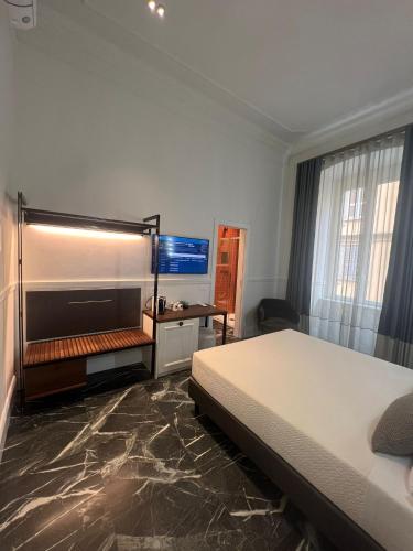 Ένα ή περισσότερα κρεβάτια σε δωμάτιο στο Lovely Rooms
