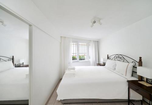 Ένα ή περισσότερα κρεβάτια σε δωμάτιο στο Cute Charming 1bed1bath Bebek Hidden Gem! #77