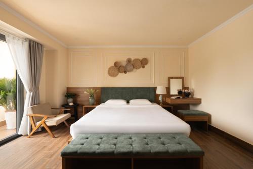 Katil atau katil-katil dalam bilik di Lumina Hotel Da Lat Central