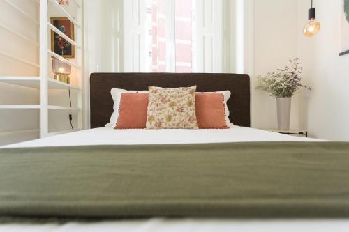 Letto o letti in una camera di Vila Julieta Guesthouse