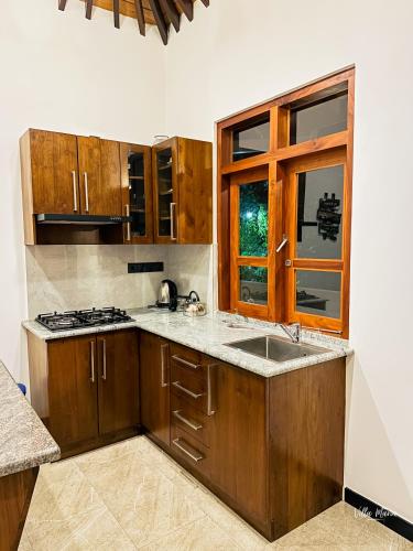 Dapur atau dapur kecil di Villa Maria
