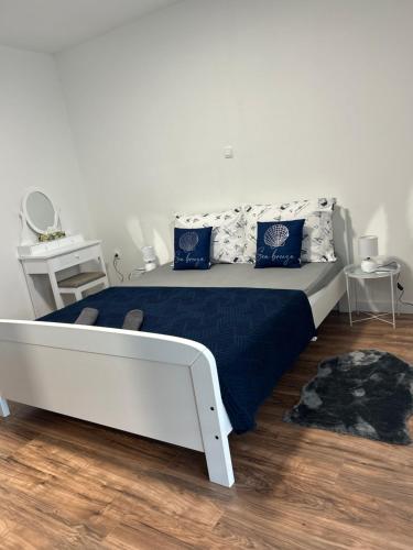 Ένα ή περισσότερα κρεβάτια σε δωμάτιο στο Gabriel III