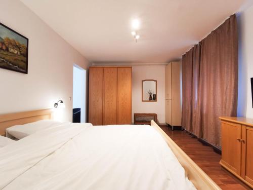 Ένα ή περισσότερα κρεβάτια σε δωμάτιο στο Apartament BOCA 2