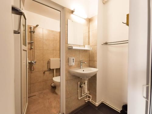 Ένα μπάνιο στο Apartament BOCA 2