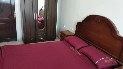 Una cama o camas en una habitación de Hotel Al Andalous