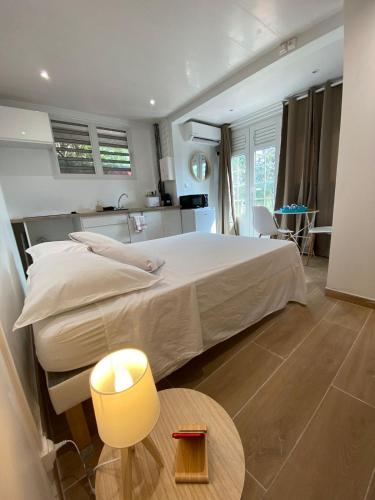 Cama o camas de una habitación en Studio coco 2 personnes