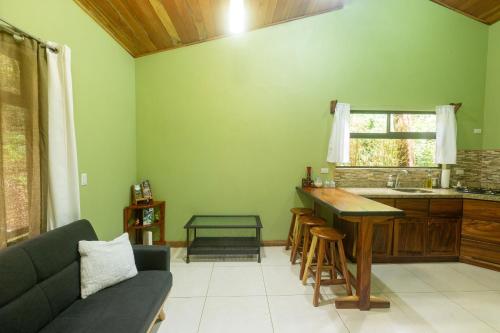 a living room with a couch and a table at Casas Clusia in Monteverde Costa Rica