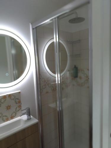 a bathroom with a shower and a sink at CRALS - Casa do Corgo in Barroselas