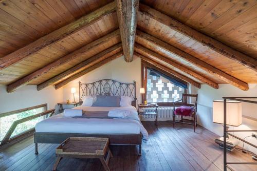 En eller flere senge i et værelse på La Casa della Piana