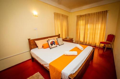 Postel nebo postele na pokoji v ubytování Sunbloom Hostel