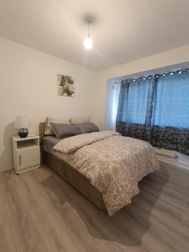 Postel nebo postele na pokoji v ubytování Olashade Villa