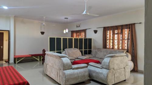 Гостиная зона в JACARANDA HOMESTAY