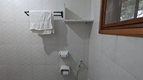 Ванная комната в JACARANDA HOMESTAY