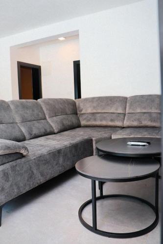 a living room with a couch and a table at Zen Oaza in Konjic