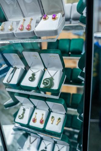 a display case with several boxes of engagement rings at Talbot Arm Motel in Destruction Bay