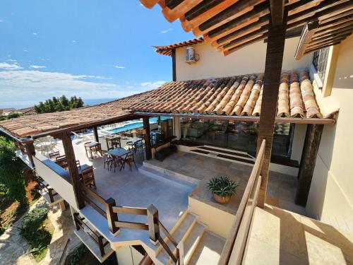 an aerial view of a house with a patio at Pousada Dreamland Buzios in Búzios