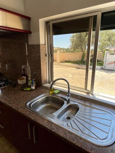 Kuchyň nebo kuchyňský kout v ubytování Vila Glória Guesthouse