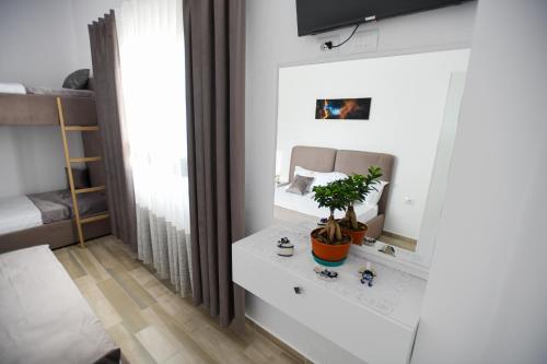 Postel nebo postele na pokoji v ubytování Vila Rivaaa