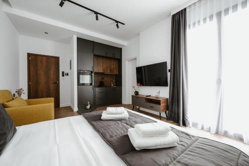 Postel nebo postele na pokoji v ubytování Port View Suites