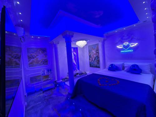 a purple room with a bed with a sign on it at Albicocche house Catania in Catania