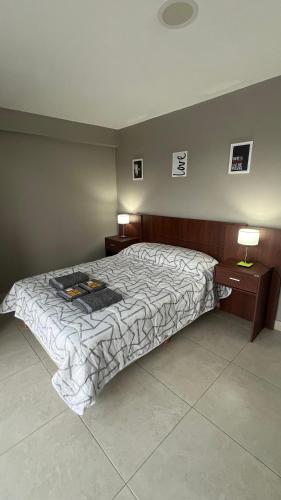 En eller flere senge i et værelse på Vista a Magallanes