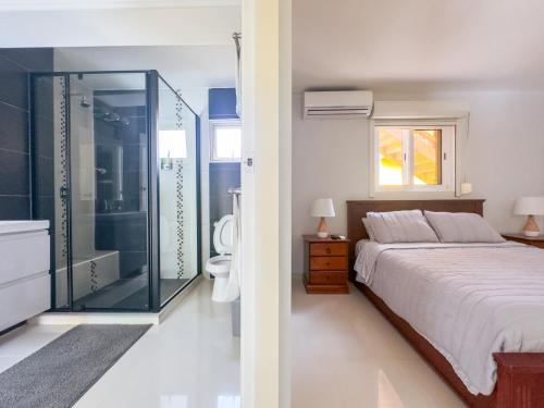 Llit o llits en una habitació de Villas Del Sol