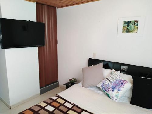Postel nebo postele na pokoji v ubytování HABITACIÓN EN SUBA, Bogotá