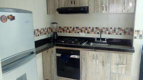 Kuchyň nebo kuchyňský kout v ubytování HABITACIÓN EN SUBA, Bogotá