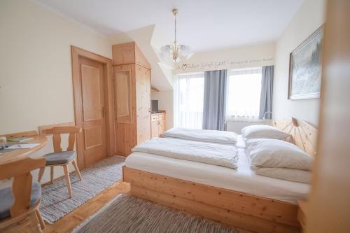Postel nebo postele na pokoji v ubytování Gästehaus Maurer/Bader