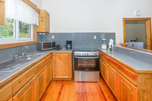Kuchyň nebo kuchyňský kout v ubytování Wescot Villas Sky View