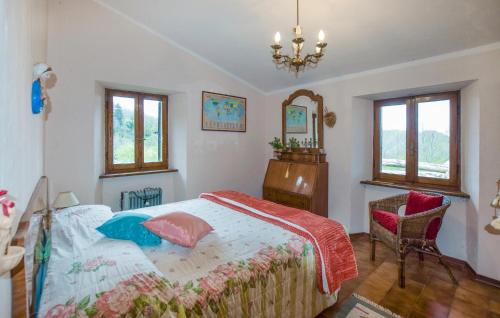 Postel nebo postele na pokoji v ubytování Cozy Home In Palagnana